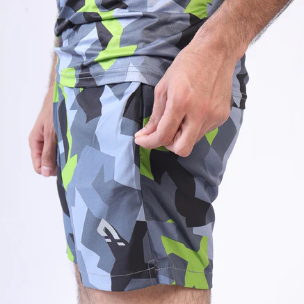 An orange painted blue, cut in half laying on a blue background