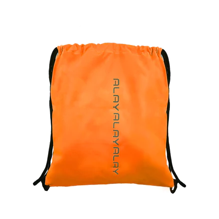 An orange painted blue, cut in half laying on a blue background